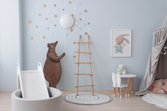 Beautifully decorated baby nursery showcasing Stella Moon Co's signature style, with coordinated colors and cozy furnishings.