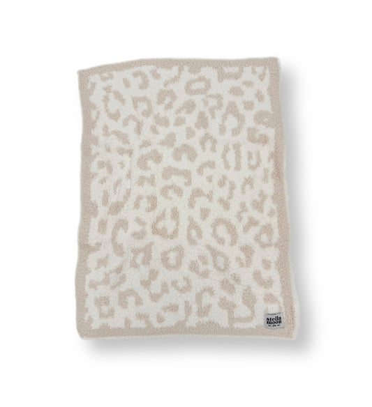 Top side view of StellaMoon's Luxe Mini Blanket in Leopard print, displaying its plush texture and intricate leopard design.