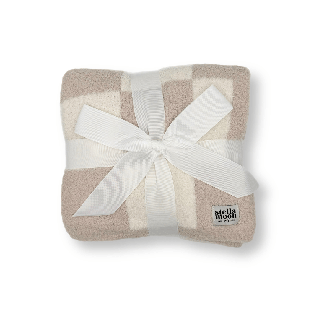 StellaMoon's Luxe Checkered Baby Blanket in elegant grey, highlighting its plush texture and classic checkered pattern.