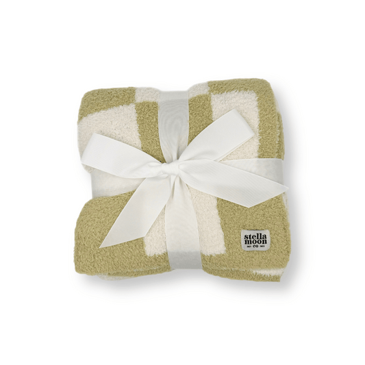 StellaMoon's Luxe Checkered Baby Blanket in rich Matcha green, showcasing the refined checkered design and plush texture.