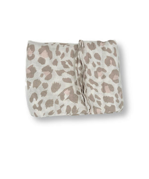 Cheetah pattern bamboo swaddle blanket, showcasing its unique print and soft, breathable fabric, ideal for versatile baby care.