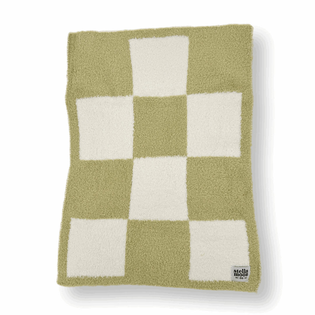 Close-up of the Luxe Checkered Mini Baby Blanket in Matcha Green by Stella Moon Co., showcasing the soft texture and checkered pattern.