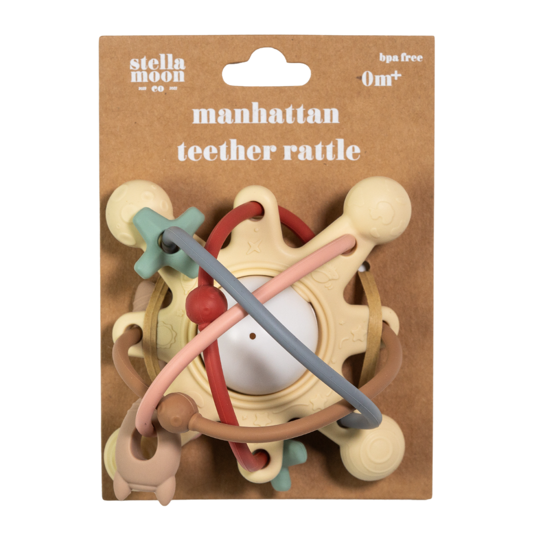 Straight front shot of StellaMoon's Manhattan Teether Rattle in elegant neutral tones, showcasing its space-inspired loop design and textured details.