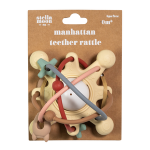 Straight front shot of StellaMoon's Manhattan Teether Rattle in elegant neutral tones, showcasing its space-inspired loop design and textured details.